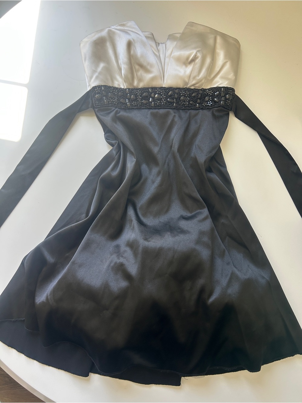 B Darlin Strapless Satin Cocktail Dress in White and Black with Beaded Waist